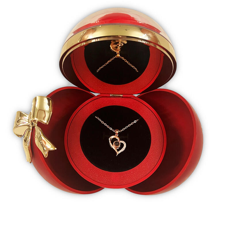 Collar Corazón con empaque de bola roja