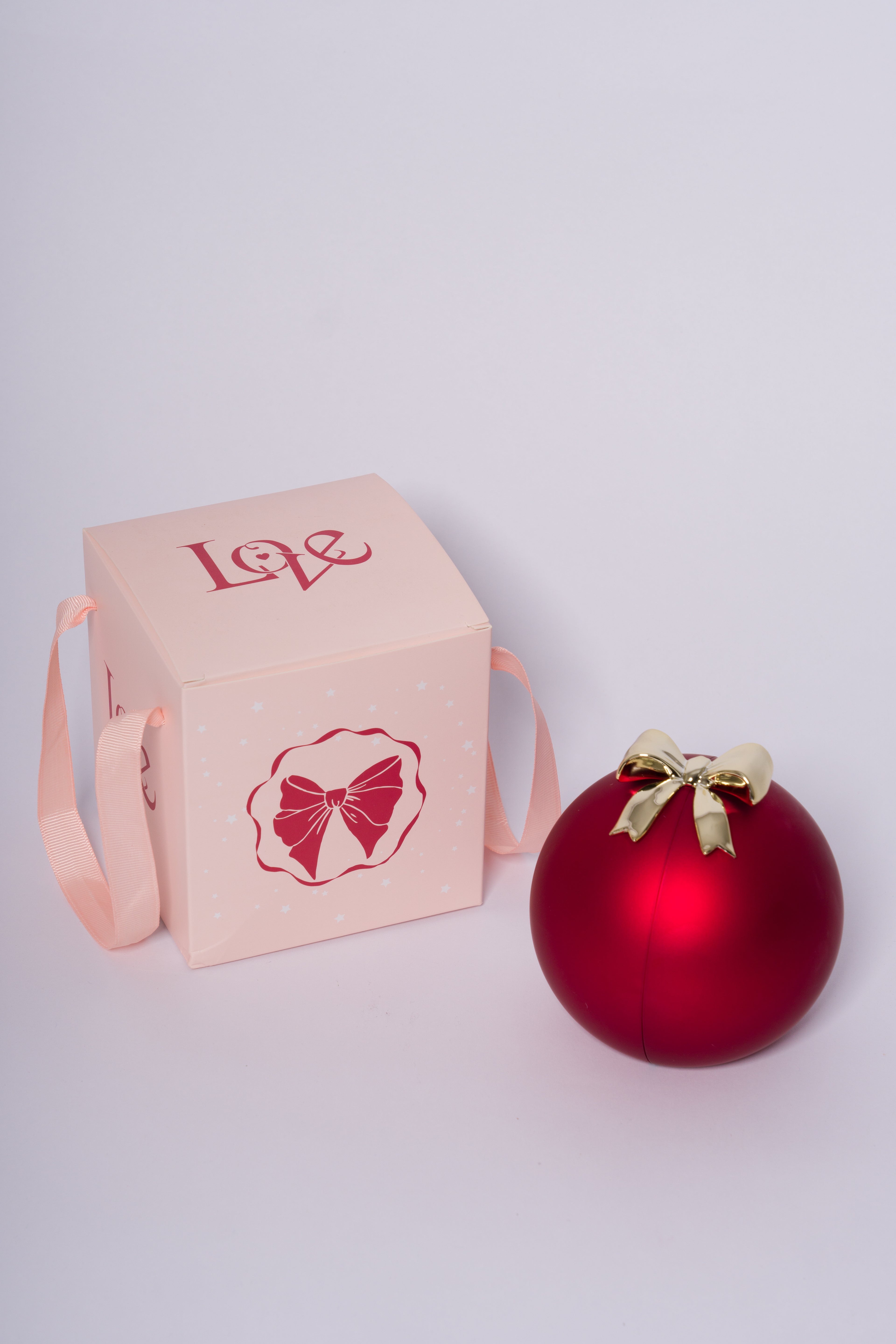 Collar Corazón con empaque de bola roja